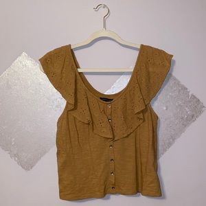 Mustard colored crop top with ruffle collar